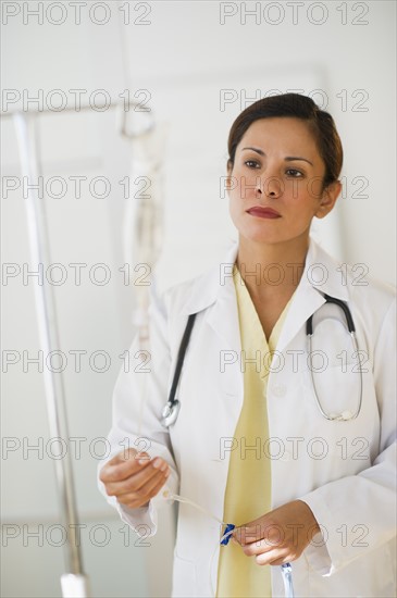Female doctor with IV drip.