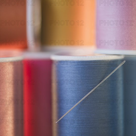 Spools with colorful threads. Photo: Jamie Grill Photography