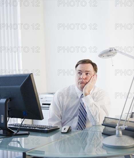 Businessman in office. Photo: Jamie Grill Photography