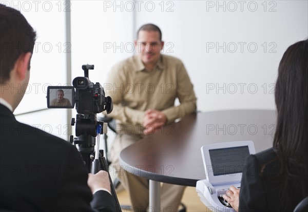 Testimony being videotaped. Photo : Daniel Grill