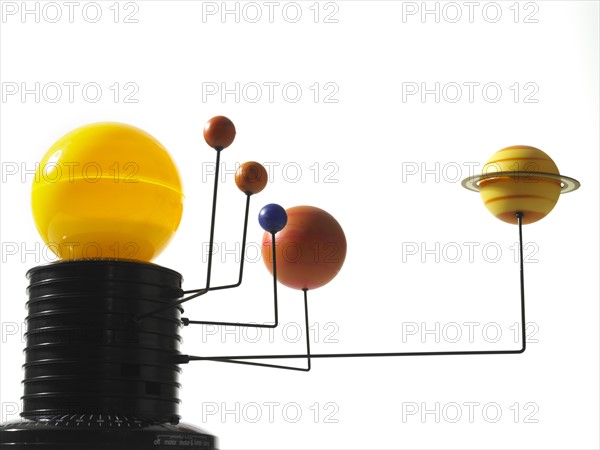 Solar system model on white background. Photo: David Arky