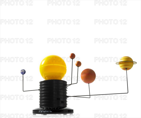 Solar system model on white background. Photo: David Arky