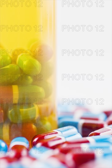 Studio shot of capsules and pill bottle. Photo : Antonio M. Rosario