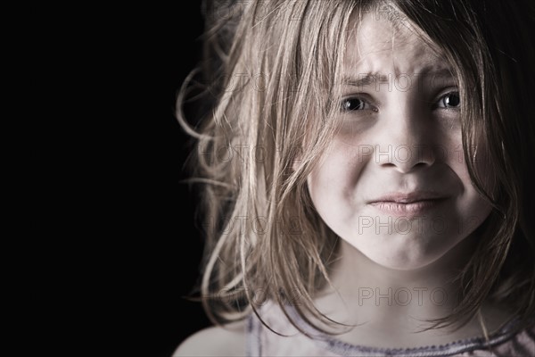 Studio portrait of girl (6-7). Photo: Justin Paget