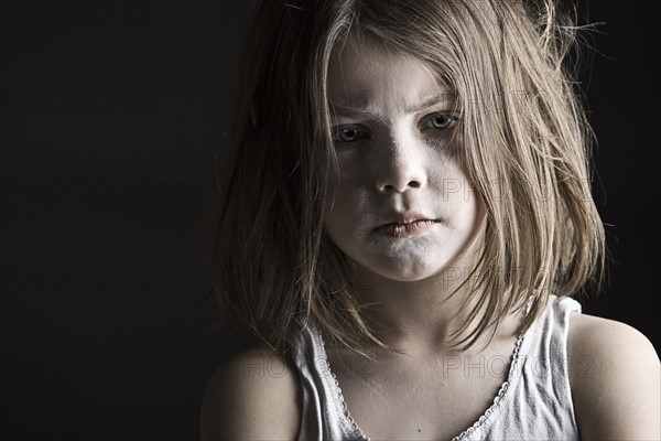 Studio portrait of sad girl (6-7). Photo : Justin Paget