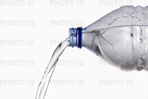 Pouring Cold Water from Bottle