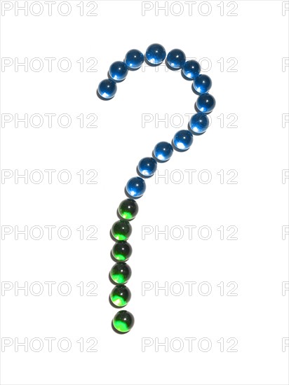 Question mark arranged of blue and glass balls. Photo : David Arky