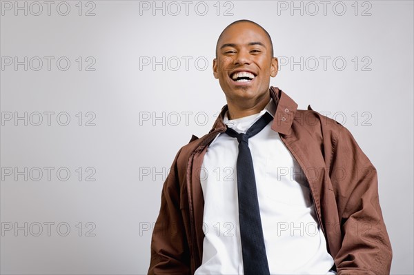 Studio portrait of young man wearing jacket. Photo: Noah Clayton