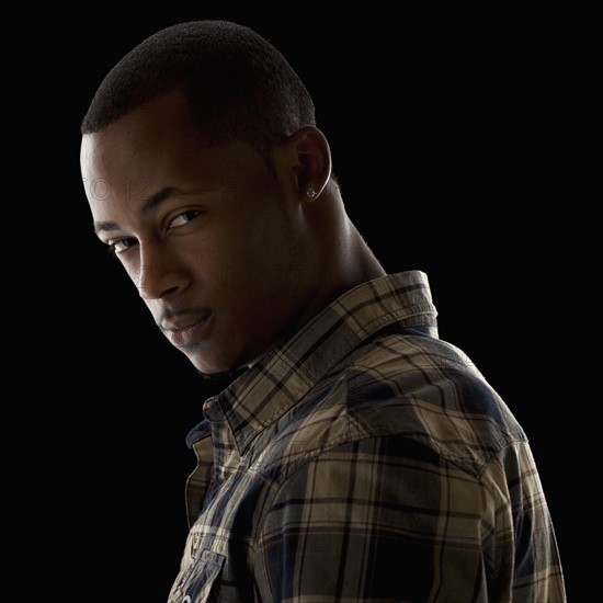 Studio portrait of young man. Photo : Mike Kemp