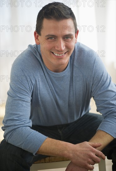 Portrait of mid adult man smiling.