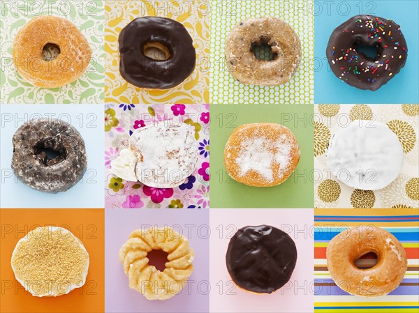 Selection of doughnuts on colorful background.