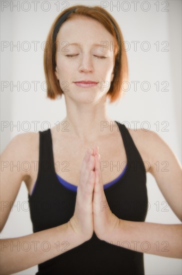 Woman doing yoga position. Photo: Jamie Grill Photography