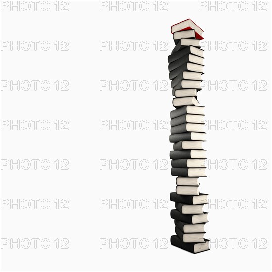Stack of grey books and one red. Photo: Jon Boyes