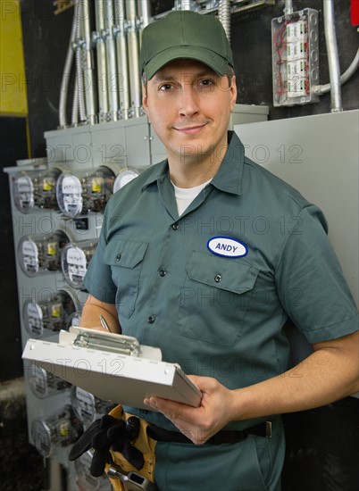 Electrician controlling electric meters.