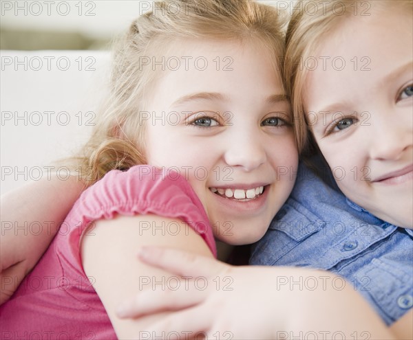 Portrait of two sisters (8-11). Photo: Jamie Grill Photography