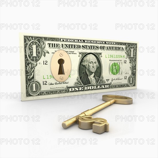 Dollar bill with lock inside, key with Dollar Symbol laying beside. Photo: Jon Boyes