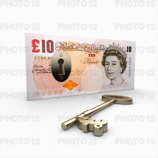 Ten Pond banknote with lock inside, key with Pound Sterling symbol laying beside. Photo : Jon Boyes