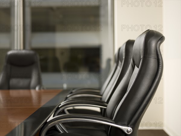 Paper and telephone in board room. Photo : Dan Bannister