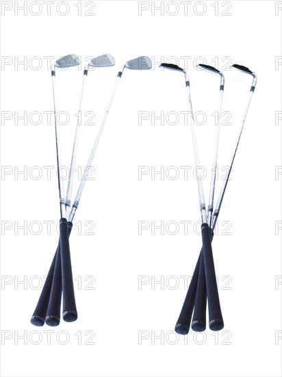 Golf clubs on white background. Photo: David Arky