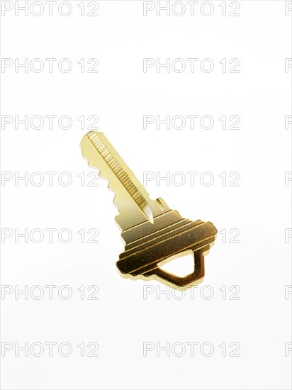 House key on white background. Photo : David Arky