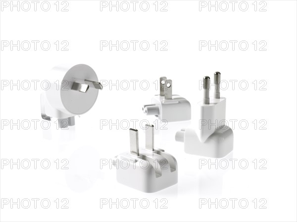 Plugs on white background. Photo : David Arky