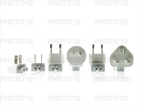 Plugs on white background. Photo : David Arky