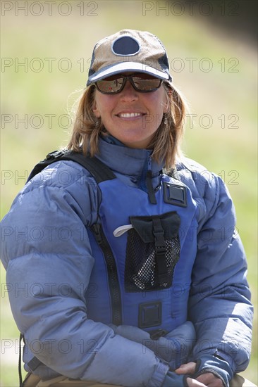 USA, Montana, Smith River, Portrait of woman hiking. Photo : Noah Clayton