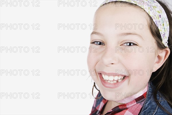 Studio portrait of girl (8-9). Photo : Justin Paget