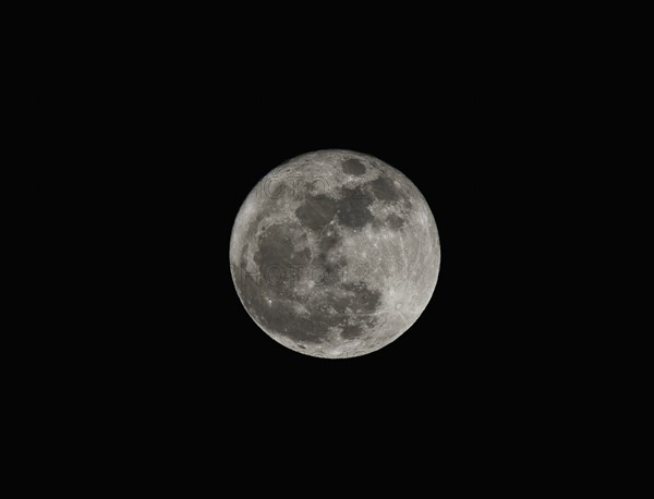 Full moon against night sky.