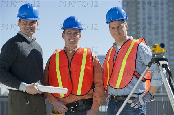 USA, New Jersey, Jersey City, portrait of three construction workers.