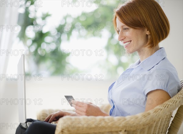 Woman shopping online. Photo: Jamie Grill Photography