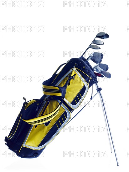 Golf bag with clubs on white background. Photo: David Arky