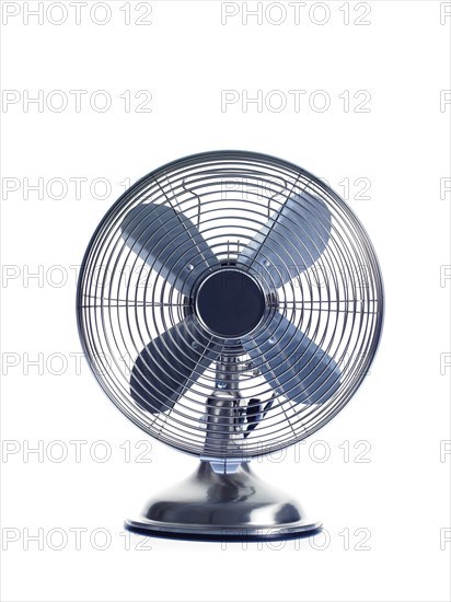 Electric fan on white background. Photo : David Arky