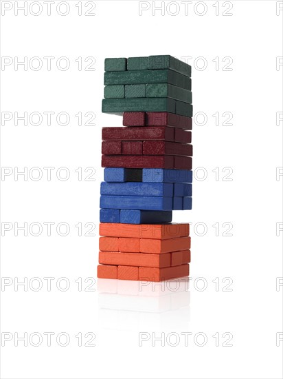 Studio shot of colorful wooden jenga blocks. Photo : David Arky