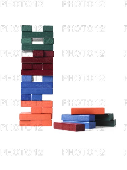 Studio shot of colorful wooden jenga blocks. Photo : David Arky