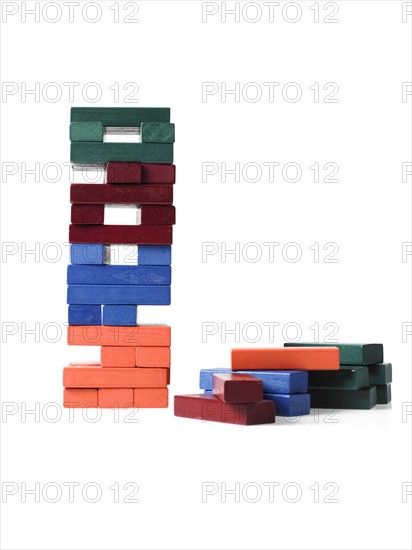 Studio shot of colorful wooden jenga blocks. Photo : David Arky