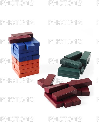 Studio shot of colorful wooden jenga blocks. Photo: David Arky