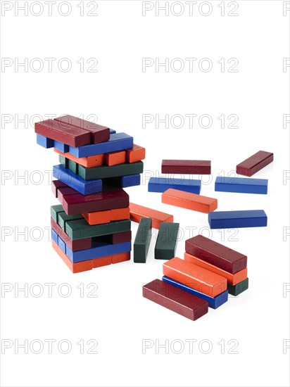 Studio shot of colorful wooden jenga blocks. Photo : David Arky