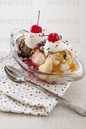 Close up of ice cream dessert with colorful topping.