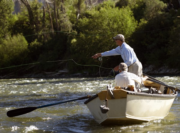 USA, Colorado, Pair of men fly-fishing. Photo : John Kelly