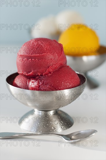 Close up of ice cream in bowls.