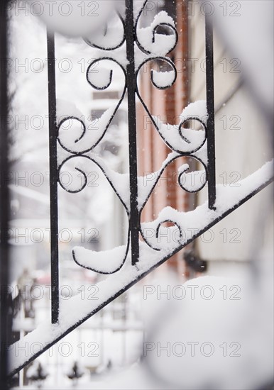 USA, New York State, Brooklyn, Williamsburg, railing covered with snow. Photo: Jamie Grill Photography