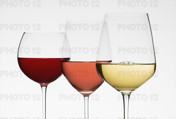 Close up of glasses of different wines.