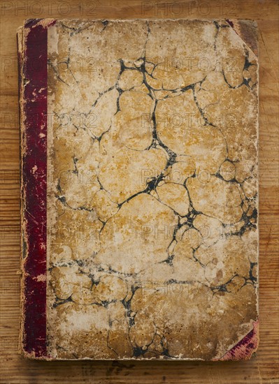 Close up of antique book cover.