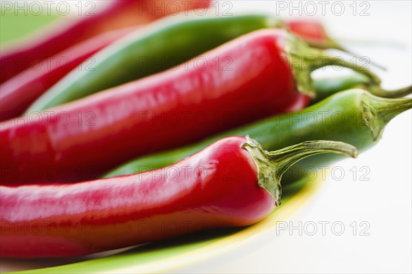 Studio shot of red and green Chili Peppers.