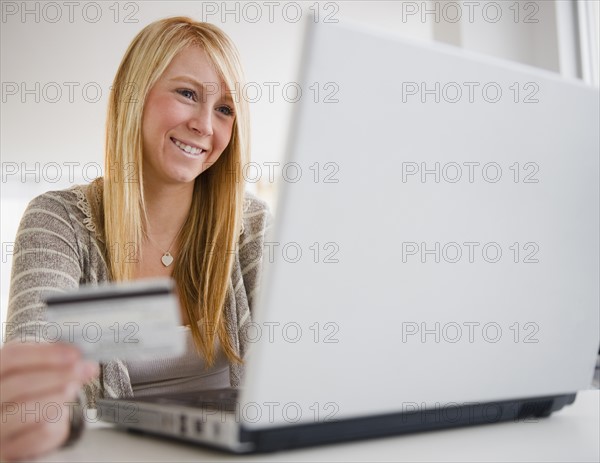 Woman shopping online. Photo : Jamie Grill Photography
