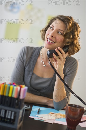 Woman working in home office.