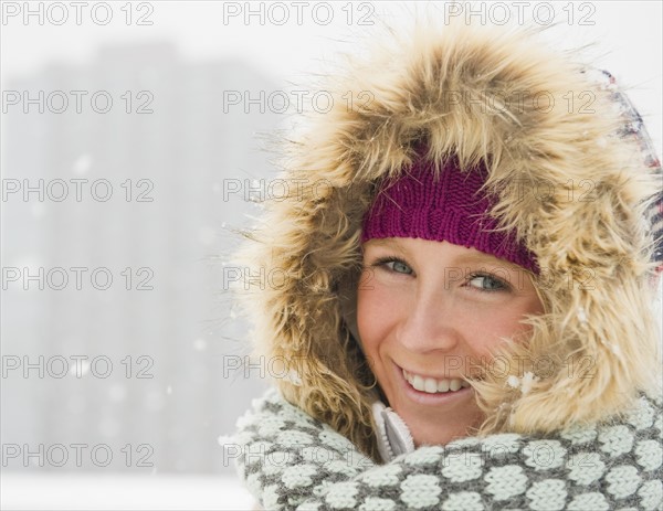 Jersey City, New Jersey, portrait of woman wearing warm clothing. Photo: Jamie Grill Photography