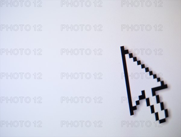 Studio shot of arrow cursor. Photo : Jamie Grill Photography