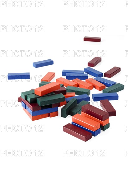 Studio shot of colorful wooden jenga blocks. Photo : David Arky